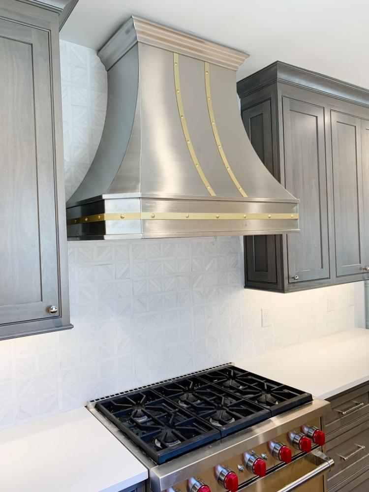 grey cabinets with steel hood