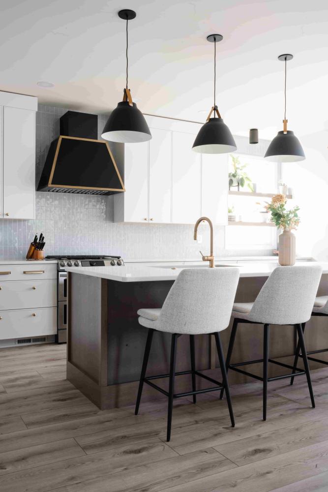 white kitchen cabinets with black range hood